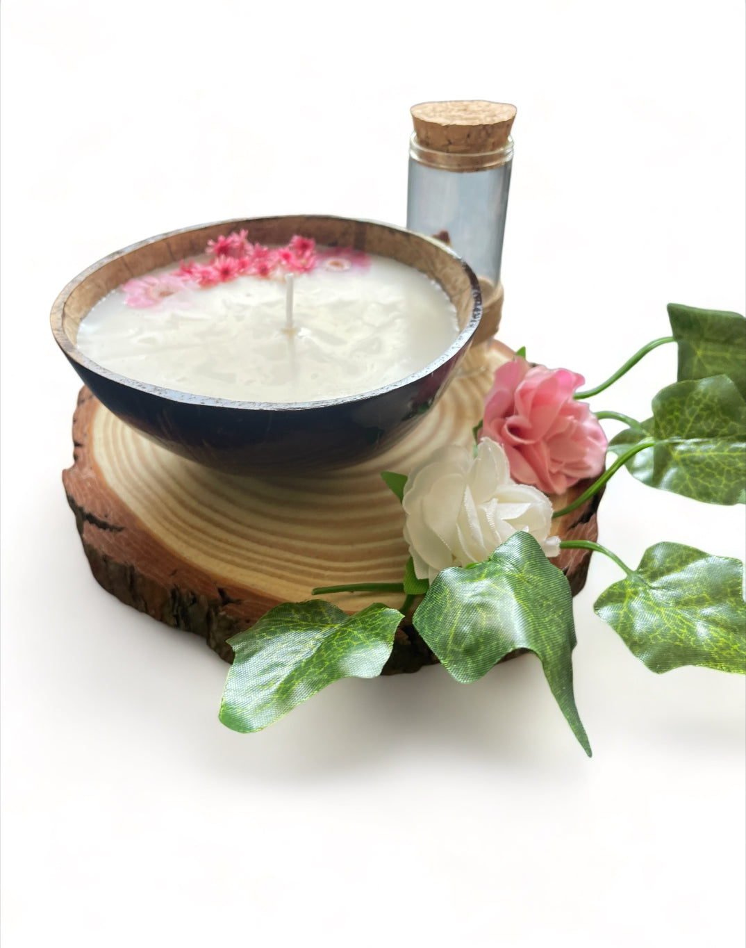 VANILLA Scented coconut shell soy wax candles with wooden slice and bottle of matches.