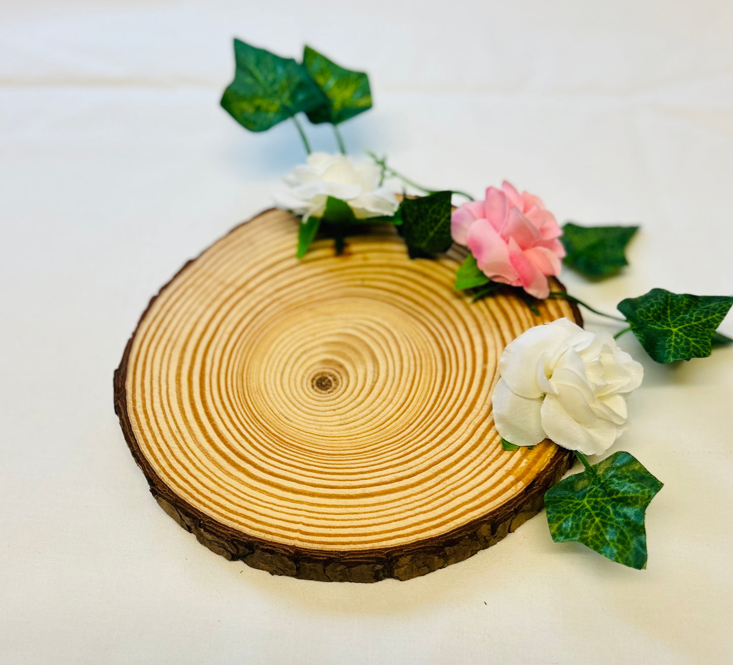 VANILLA Scented coconut shell soy wax candles with wooden slice and bottle of matches.